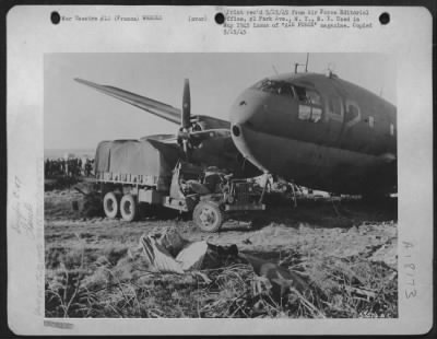General > First Casualty Was This Commando That Veered Off Runway During Take-Off, Ploughed Through String Of Vehicles Near Control Tower.  Four Paratroopers Were Injured, Two Jeeps Flattened, Truck Damaged.