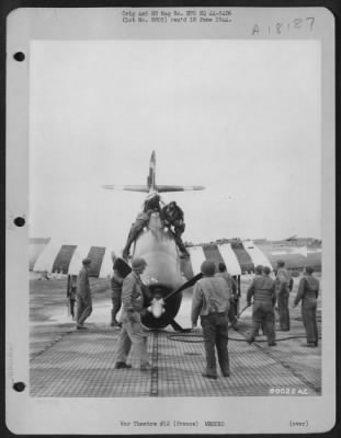 Thumbnail for General > Air Force Ground Crewmen Lift Out The Unconscious Pilot Of A Republic P-47 After His Flak Riddled Plane Crashed On A New Airstrip Somewhere In France.  16 June 1944.