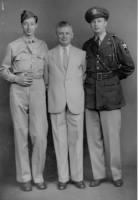 conrad silverman-on left- in light-colored jacket with father tobias and brother leo.jpg