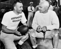 Bernie Bierman, right, chats with Tom Harmon.jpg