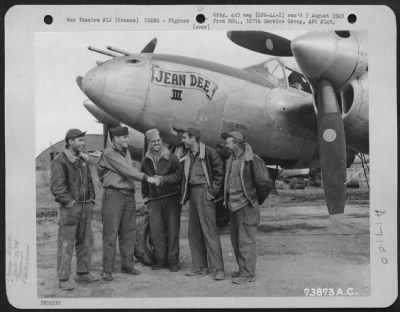 General > Major Joy And Ground Crew Of The 367Th Fighter Group, Pose Beside Their Lockheed P38 'Jean Dee Iii' At An Air Base Somewhere In France.  7 October 1944.