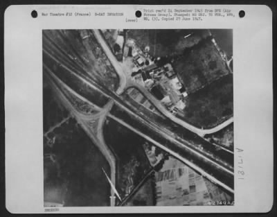 General > A Night Aerial Photo Take On D-Day During The Invasion Of France Shows An Important Railway Junction.  The Flash Was Made By An Electric Bulb Called The 'D-2' Developed By Engineers Of Air Technical Service Command Engineers In Cooperation With General El