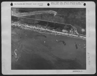 General > Aerial View Of Omaha Beach, Normandy, France, Taken 6 June 1944, Showing Landing Of Two Infantry Regiments (18Th And 115Th), Vehicles, And Landing Craft.
