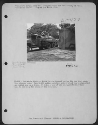 Thumbnail for Supplies > France - The Mobile 9Th Air Force Service Command Carriers Its Own Giant Gasoline Storage Tanks.  This 10,000 Gallon Container Made Of Steel Can Be Dismantled And Carted Away On A Truck.  It Takes A Team Of Six Men Approximately Three Days To Set It Up Fo