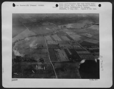 General > Cg-4 Gliders Come To Earth In Briefed Dropping Area Outside Le Muy, France.  Dust Clouds Kicked Up By Gliders Have Not Yet Settled.