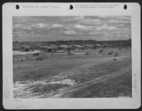 Douglas C-47 And Gliders Of The 9Th Troop Carrier Command Await Take Off Signal At An Airfield Somewhere In France.  12 March 1945. - Page 1