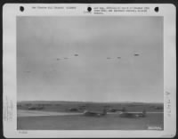 Douglas C-47S Towing Cg-4 Gliders Pass Over A 9Th Troop Carrier Command Base Somewhere In France.  12 March 1945. - Page 9