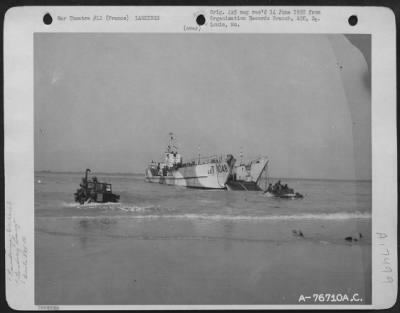 Thumbnail for General > Members Of The 834Th Engineer Aviation Battalion Debark From Lct'S (Landing Craft- Tank) At Normandy, France.