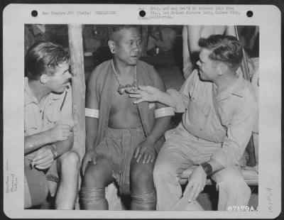 Consolidated > As Chief Of A Local Tribe, This Naga Headhunter Was Highly Respected As A Warrior, And For This Reason Lt. W.L. Atwell (Right) Hired Him As An Interpreter For The Expedition Into The Burmese Jungles For The Purpose Of Setting Up Yank Outposts.  Lt. Atwell