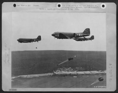 Thumbnail for Consolidated > Rangoon Assault - As The Chutes Of Three Gurka Paratroopers Open Up Over Their Dropping Zone Near Rangoon, Three More Gurkhas Stolidly Step Out Of Usaaf C-47'S Of The Combat Cargo Task Force, Eastern Air Command. This Is Precision Jumping In The Airborne