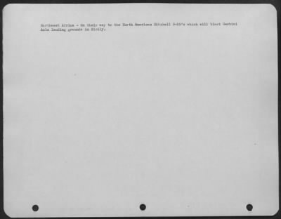 Consolidated > Northwest Africa-On their way to the North American Mitchell B-25's which will blast Gerbini Axis landing grounds in Sicily.