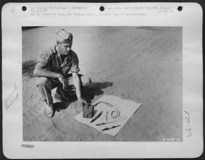 Thumbnail for Consolidated > 1st Lt. Robert E. Ward, of Los Molinos, Calif., displays some of his handiwork.