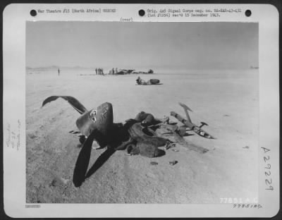 Consolidated > Lockheed P-38 of the 1st Fighter Group wrecked by a runway collision with another Lockheed P-38 at Biskra, North Africa. 15 January 1943.