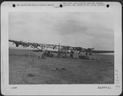 Consolidated > Tunis, Tunisia-The wreckage of German and Italian aircraft on the El Aouina airfield in Tunis.