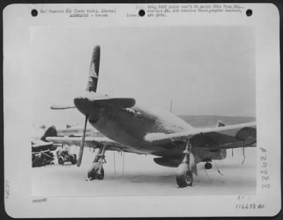 Consolidated > A North American P-51 covered with snow after a snowstorm at Ladd Field, Alaska, 12 February 1944.