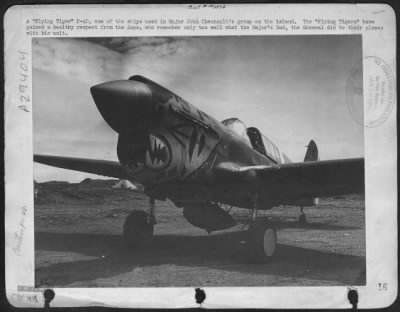 Consolidated > A "Flying Tiger" P-40, one of the ships used in Major John Chennault's group on the island. The "Flying Tigers" have gained a healthy respectform the Japs, who remember only too well what the Major's Dad, the General did to their planes with his unit