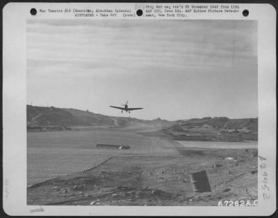 Consolidated > A Curtiss P-40 takes off from a fighter stirp at its 11th Air Force base near Amchitca, Aleutian Islands. 12 October 1943.