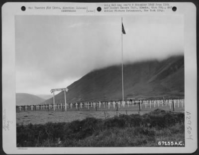 Consolidated > Little Falls Cemetery, Attu Island, Aleutian Islands, 27 September 1943. Note the fog bank covering the top of the mountain.