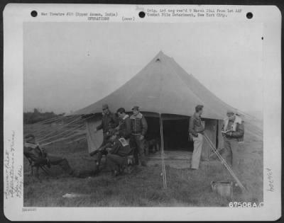 Thumbnail for Consolidated > Pilots Of Curtiss P-40'S Sit In Front Of The 80Th Fighter Group Alert Tent, Ready To Dash To Their Planes In The Event There Is A Jap Attack - Upper Assam, India, February 1944.