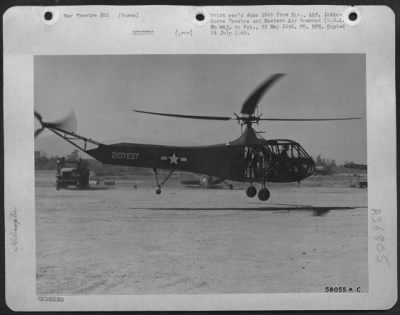 Consolidated > Being Needed For Rescue Work In The Burma-India Theater A Sikorsky Yr-4 Helicopter Was Flown From Wright Field, Ohio In A Douglas C-54.  At Noon The Day Following Its Arrival At Myitkyina, Burma The Helicopter Is Shown Taking Off On Its First Test Flight