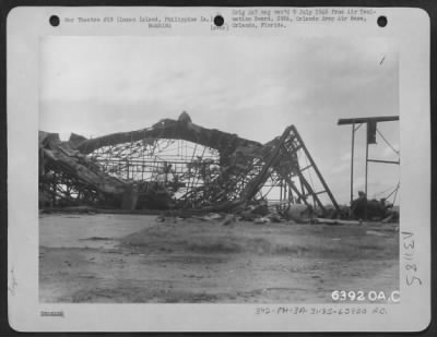 Consolidated > The hangars on the main Clark Air Strip were heavily bombed by units of the American Air Forces. Luzon Island, Philippine Islands. 1945.