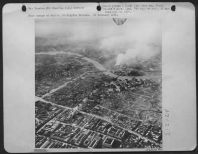 Consolidated > Bomb damage at Manila, Philippine Islands. 15 February 1945.