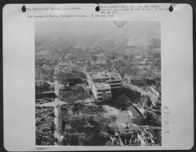 Consolidated > Bomb damage at Manila, Philippine Islands. 15 February 1945.
