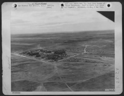 Consolidated > Manila, Philippine Islands-Clark Field hangars after attacks by AAF bombers, look as if swarms of locusts had picked them clean.