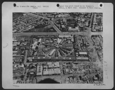 Consolidated > Bomb damage around the New Bilibid Prison in Manila, Philippine Islands, February 1945.