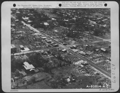 Consolidated > Remains of Davao City, Mindanao, after Allied bombings over this area. The city had a pre-war population of 24,521. After American occupation, the natives collected sheets of tin from destroyed buildings to re-build their shacks. Philippine Islands