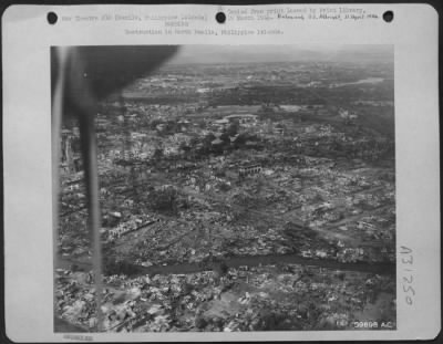 Consolidated > Destruction in North Manila, Philippine Islands.