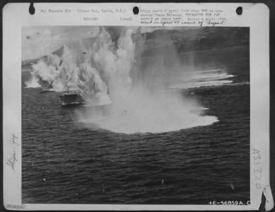 Consolidated > DISASTER FOR JAP CONVOY AT ORMOC BAY--The Japanese vessel in picture No. 4. is seen here suffering direct hits. Two ships of this type were sunk during this attack by bombers and fighters of the Far East Air Forces on a Jap convoy trying to reinforce