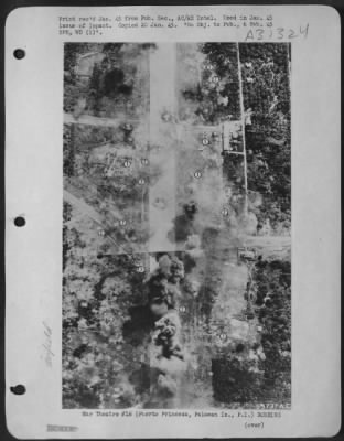 Consolidated > Oblique of Puerto Princesa airdrome, Palawan Island, P.I. showing bombs walking neatly down runway during 28 Oct. 1944 attack by FEAF. Among 23 destroyed and 10-15 damaged are (1) Bettys and (2) unidentified S/E aircraft.