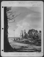 Bomb damaged buildings at Palawan, Philippine Islands. 17 July 1945. - Page 1