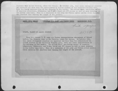Thumbnail for Consolidated > This is a recent U.S. Army Air Forces reconnaissance photograph of Rabaul harbor, big Japanese base on New Britain, above New Guinea. On October 12th, this enemy stronghold received the heaviest air blow thus far administered by Allied raiders
