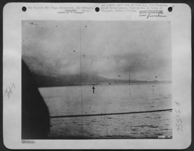 Consolidated > North American B-25 goes down from LST gunfire on 26 Dec 43 off Caps Gloucester, New Britain. A North American B-25 squadron approaching Natamo Point targets, had opened fire on a Jap "Val" which crossed its path.