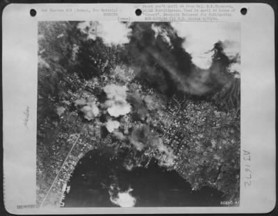Consolidated > Town of Rabaul, New Britain is bombed on 2 March 44 by all-star cast of 48 SHDs, 24 TBFs, 16 P-40s and 24 B-25s, dropping 1,000 lb bombs on Customs Wharf.