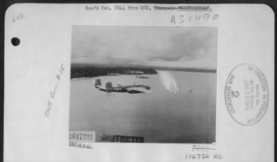 Consolidated > North American B-25 Mitchells Over Gasmata Island, New Britain.