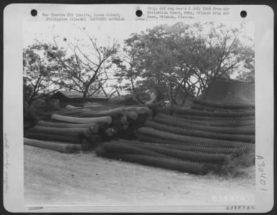 Consolidated > Jap Steel matting ostensibly for use as matting for airstrip, found at Santo Tomas University in Manila, Luzon Island, Philippine Islands, February 1945.