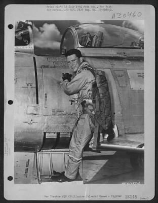 Consolidated > HQ. FEAF, TOKYA--Major Jack S. Wilson Climbs aboard his U.S. Air Force F-86 Sabrejet at Clark Air Force Base in the Philippines before leading a flight of three other Sabres of the 13th Air Force to Bangkok, Thailand, where they are scheduled