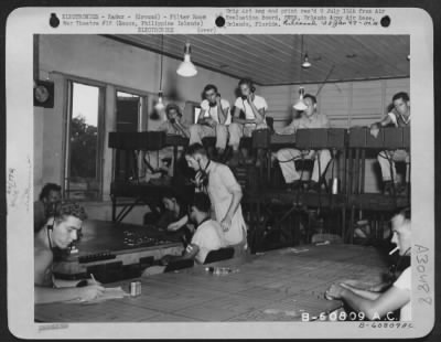 Thumbnail for Consolidated > Radar filter room of the 51st Fighter Control Center, Clark Field, Luzon, Philippine Islands. The equipment installed in February 1945 as semi-permanent is AN/TTQ.