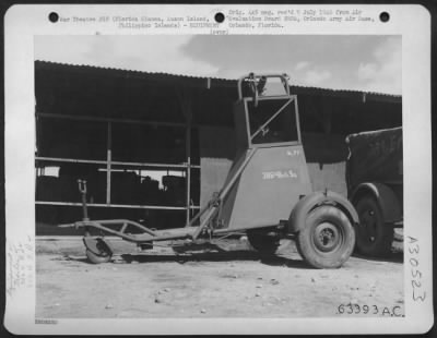 Thumbnail for Consolidated > This photograph illustrates the use of a mobile trailer that can be easily towed to the airplane from the airplane being serviced. Florida Blanca, August 1945. Florida Blanca, Luzon, Philippine Islands.