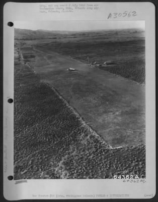 Consolidated > Carmen Strip on Pohol, Cebu, Philippine Islands which may have been used by Japanese for staging of air attacks against Leyte when American forces landed there. Part of this strip was in sufficiently good repair for Curtis C-46s and Douglas C-47s to