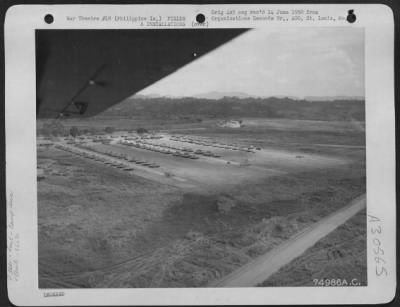 Consolidated > General view of the 866th Engineer Aviation Battalion camp area at an air base in San Jose, Mindoro, Philippine Islands. 12 February 1945.