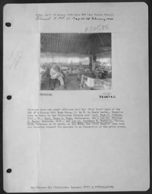 Thumbnail for Consolidated > Pictured here are staff officers from the "Wolf Pack" unit of the 5th AF's famous 38th Bomb Group. L. to R. in their bamboo, bungalow home on Luzon in the Philippine Islands are: Capt. Hugh P. O'Brien, Phil. Pa., Capt. Henry L. Pugh, Montgomery, Ala.