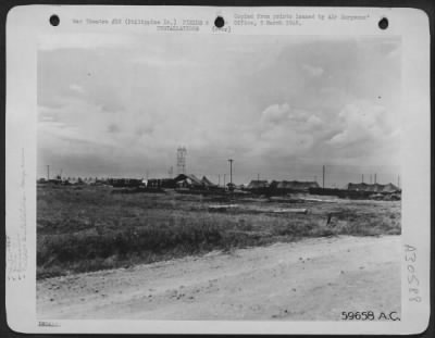Consolidated > Nielson Field, Manila, 11 May 1945. Co. "C," 264th Medical Bn. "Holding Company." General view of the company's area. All housing is in tents. Patients are evacuated by air to this holding company and from here they are taken to a General Hospital.