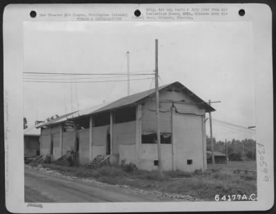 Consolidated > Headquarters 13th Air Force, Radio Transmitter shack west of Tananan, Leyte, Philippine Islands. 1945.