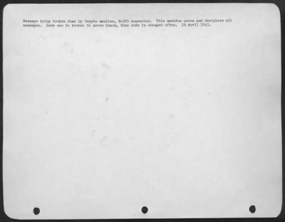 Consolidated > Message being broken down by Crypto machine, M-209 convertor. This machine codes and deciphers all messages. Code can be broken in seven hours, thus code is changed often. 26 April 1945.