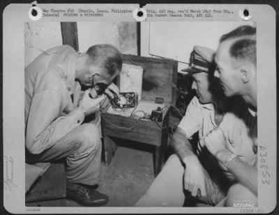 Consolidated > While he was held in Bilibid Prison, Manila, Philippine Islands with other veterans of Corregidor and Bataan, Lt. Homer Hutchinson, Pasadena, Calif., built a radio set with parts he secretly took from the Japanese. The set was concealed in the seat