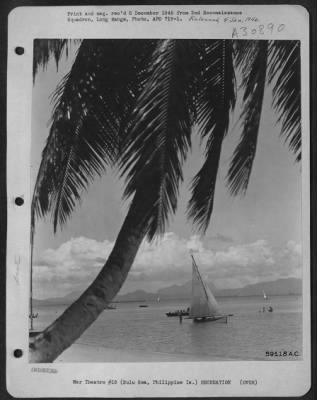 Consolidated > G.I.'s sailing in the Sulu Sea, Philippine Islands. 21 October 1945.